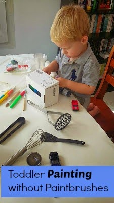Toddler Painting without Paintbrushes