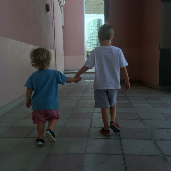 brothers holding hands
