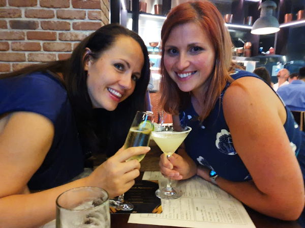 expat friendships - two women cheers